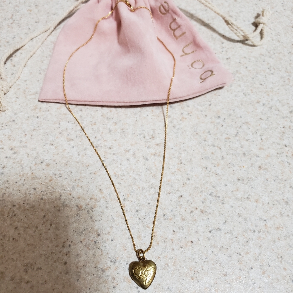 Urban Outfitters gold heart locket necklace